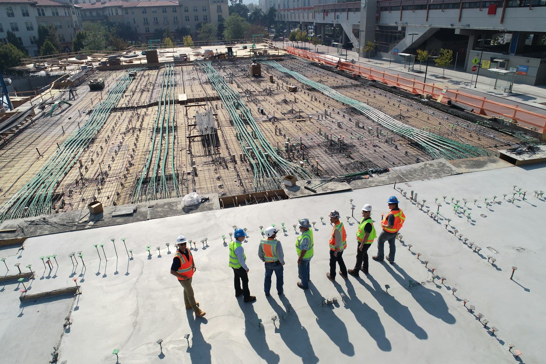 Steel framing rising on an active build