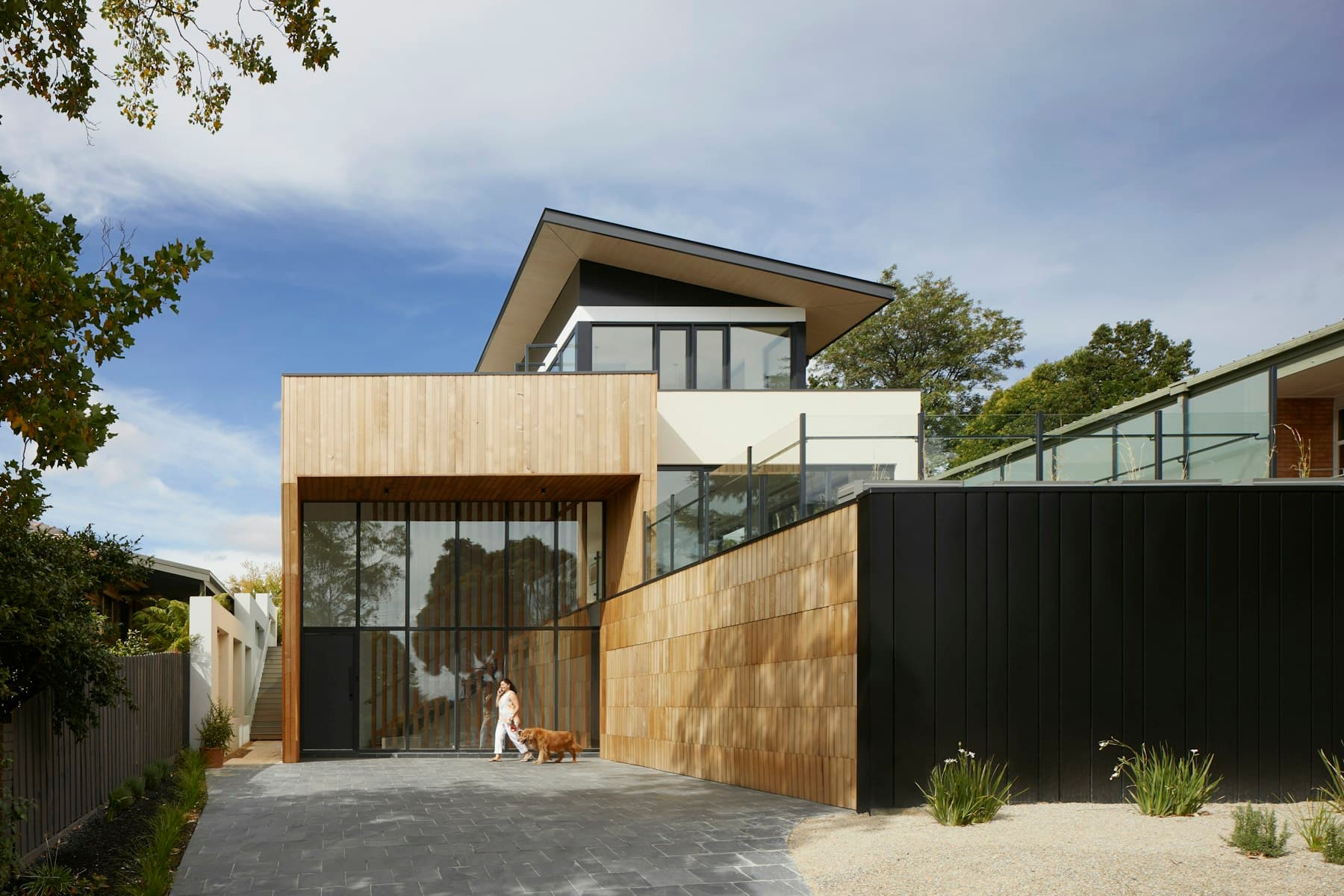 Home exterior with pool and stone patio